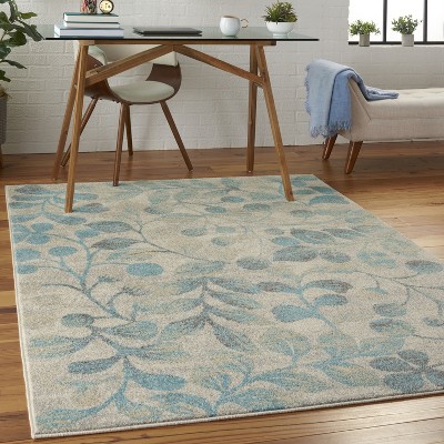 Ivory and Turquoise Floral Synthetic 6' x 9' Area Rug