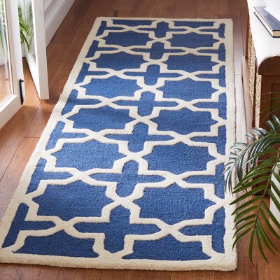 Handmade Navy Blue and Ivory Tufted Wool Round Rug