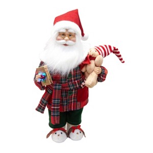 Season's Designs 17" Animated Musical LED Santa Figurine in Plaid Pajamas Multicolored Christmas Decor for Indoor Use with On/Off Switch, Music, and 4 - 1 of 1