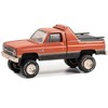 1984 Chevrolet K-10 Scottsdale 4x4 Truck Red and Black with Gold Stripes (Weathered) 1/64 Diecast Model Car by Greenlight - 2 of 3