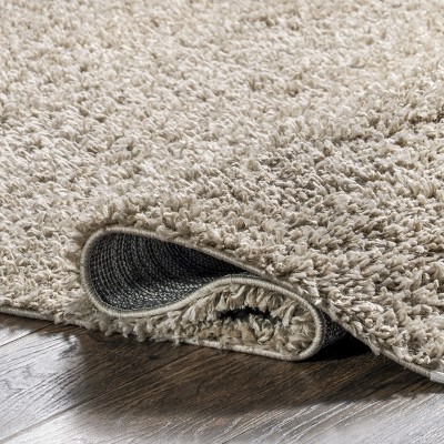 Braided Beige Rectangular Shag Area Rug with Tassels