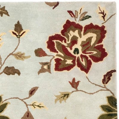 Handmade Light Blue Floral Wool 5' x 8' Area Rug