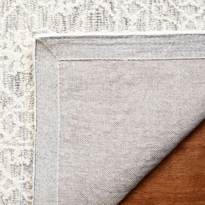 Ivory Wool 4' x 6' Hand Tufted Rectangular Rug