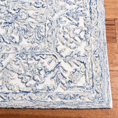Ivory and Blue Hand-Tufted Wool Area Rug, 5' x 8'