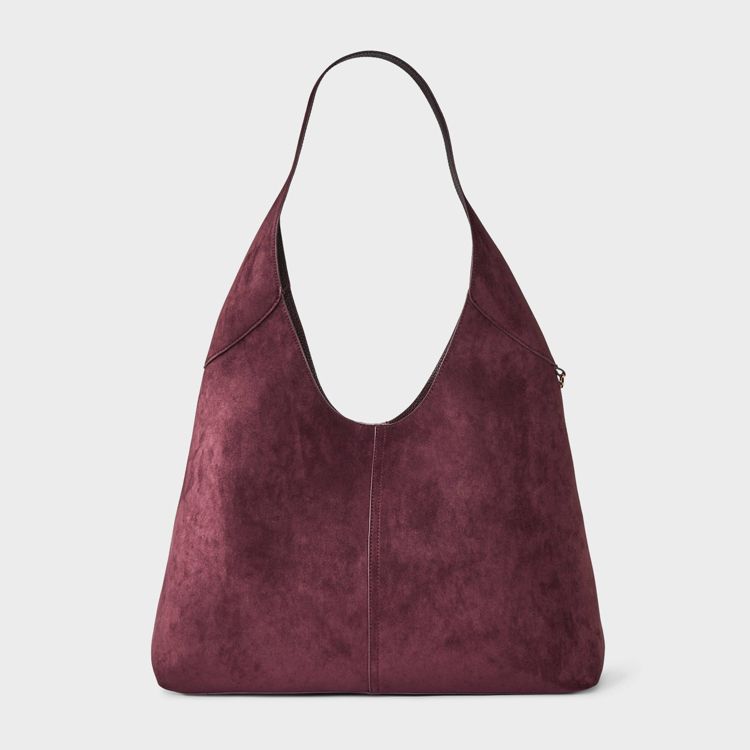 A burgundy colored hobo bag with a single strap and a soft texture.