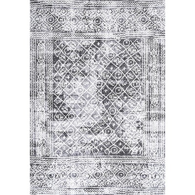 Ivory and Black Geometric Synthetic 8' x 10' Area Rug