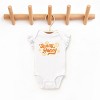 The Juniper Shop SmileyWorld Sunny Honey Flutter Sleeve Bodysuit - 3 of 4