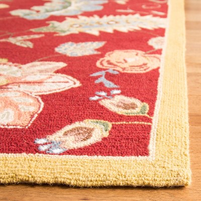 Chelsea Handmade Round Red Floral Wool Rug - 5'3" x 8'3"