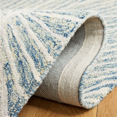 Blue and Ivory Floral Hand-Tufted Wool Area Rug, 4' x 6'
