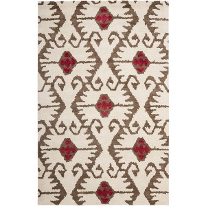 Wyndham WYD323 Hand Tufted Indoor Rugs - Safavieh - 1 of 4