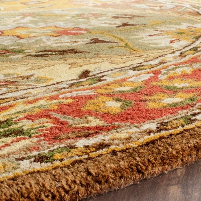 Ivory Elegance 6' Round Tufted Wool Area Rug