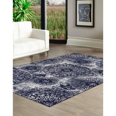 Indigo and Ivory Synthetic Low Pile Bohemian Area Rug