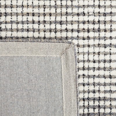 Ivory Round Handmade Tufted Wool Abstract Rug