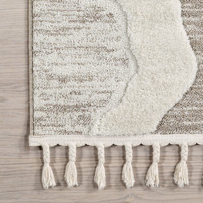 Ivory and Beige Abstract High-Low Tasseled 6'7" x 9' Area Rug