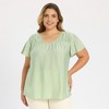 Women's Plus Size Jacquard Texture Smocked Shoulder V Neck Ruffle Sleeve Flowy Summer Casual Blouses - GRACE & GRANDEUR - 4 of 4