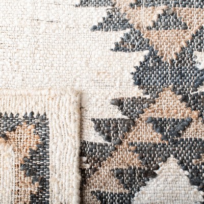 Handmade Black and Ivory Flat Woven Jute Area Rug, 27" x 10"