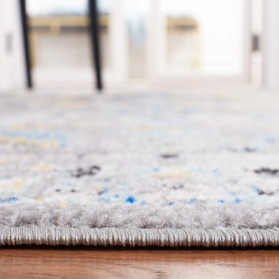 Elegance Redefined Grey & Gold Round Synthetic Area Rug - 8' x 10'