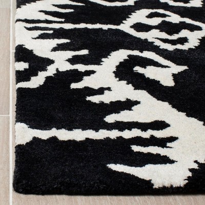 Black and Ivory Hand-Tufted Wool 6' x 9' Area Rug