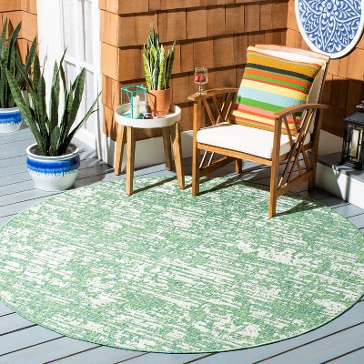 Ivory Elegance 79" Round Synthetic Indoor/Outdoor Area Rug