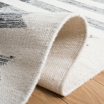 Handmade Black and Ivory Wool Flat Weave 4' x 6' Area Rug