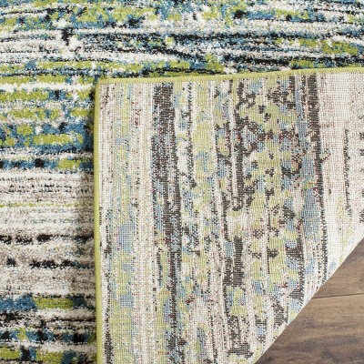 Porcello Black and Multi-Color Floral Synthetic Area Rug