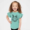 The Juniper Shop Don't Worry Be Hoppy Smiley Bunny Toddler Flutter Sleeve Tee - 2 of 2
