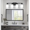 DORESshop 27 in. 4 Light Bathroom Vanity Light, Modern Matte Black Bathroom Lights Fixtures Over Mirror with Clear Glass Shade - 2 of 4