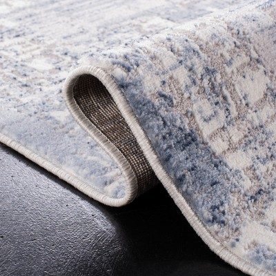 Ivory and Blue Hand-Knotted Round Synthetic Area Rug