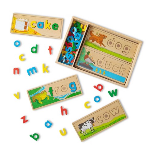 Melissa & Doug See & Spell Wooden Educational Toy With 8 Double-Sided Spelling Boards and 64 Letters - image 1 of 4