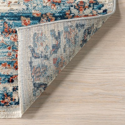 Rust and Blue Medallion Synthetic Area Rug, 6' 7" x 9'