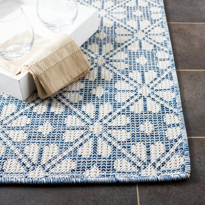 Navy and Ivory Geometric Synthetic Square Rug