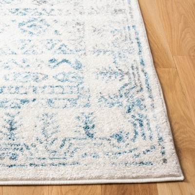 Ivory and Teal Hand-knotted Round Synthetic Area Rug