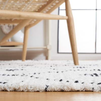 Ivory and Black Handmade Wool Shag Area Rug, 5 x 8 ft