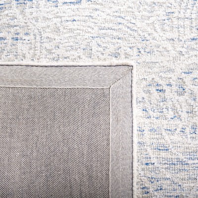 Ivory and Blue Wool 4' x 6' Handmade Geometric Rug