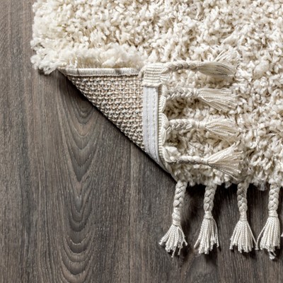 Cream 8' x 10' Reversible Shag Area Rug with Tassels
