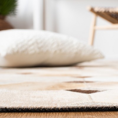 Ivory and Brown Geometric Cowhide 4' x 6' Area Rug