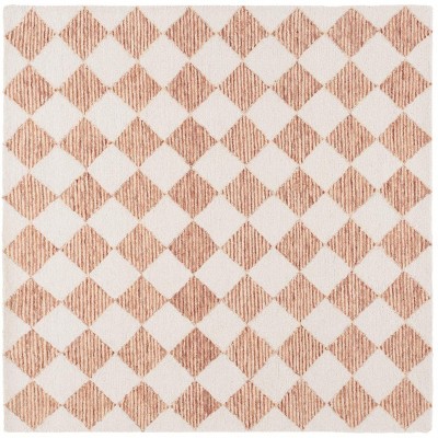 Ebony EBN120 Handmade Tufted Rug - Safavieh