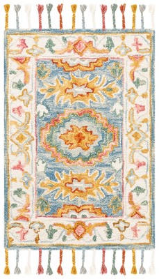 Blue and Ivory Handmade Wool Floral Area Rug