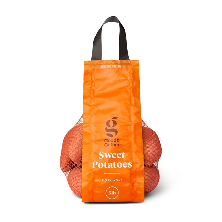 A bag of sweet potatoes labeled "Good & Gather Sweet Potatoes U.S. Extra No. 1, 3 lb" with an orange colored front and black handle.