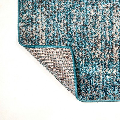 Cream and Turquoise Abstract Synthetic Area Rug