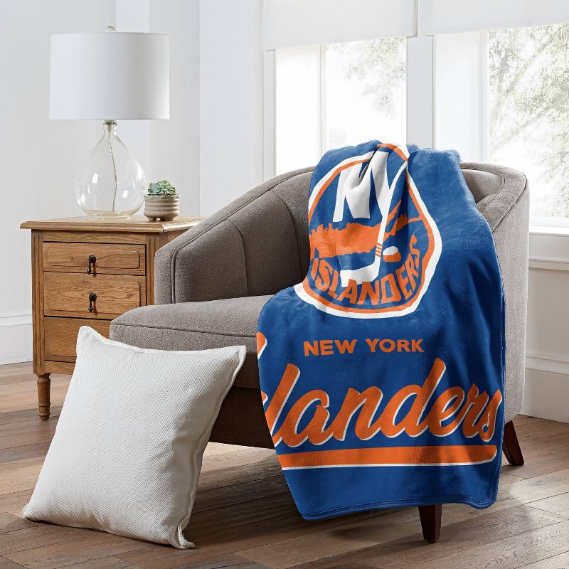 NHL New York Islanders 50 x 60 Raschel Throw Blanket, 2 of 4
