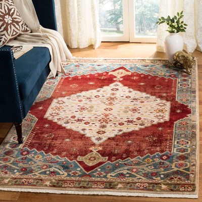 Ivory and Blue Traditional Synthetic 8' x 10' Area Rug