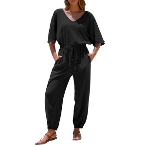 EXLURA Women's 2025 Summer Jumpsuits Casual Dressy One Piece Deep V Neck Batwing Short Sleeve Wrap Waist Romper with Pockets - 1 of 4