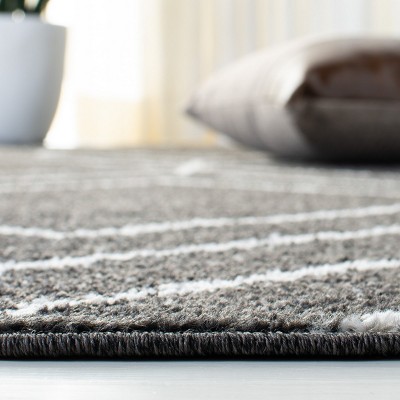 Ivory and Brown Geometric Braided Rectangular Rug