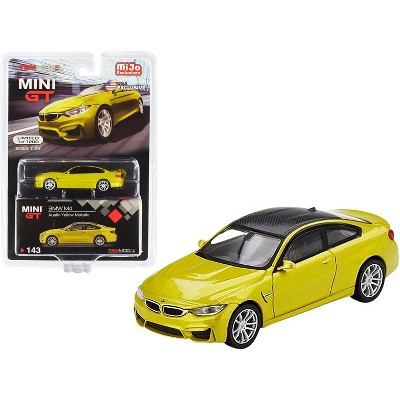 BMW M4 (F82) Austin Yellow Metallic with Carbon Top Limited Edition to 1200 pcs 1/64 Diecast Model Car by True Scale Miniatures