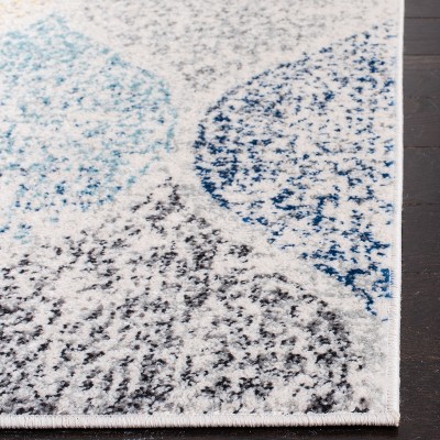 Ivory and Blue Geometric Pattern Rectangular Synthetic Rug