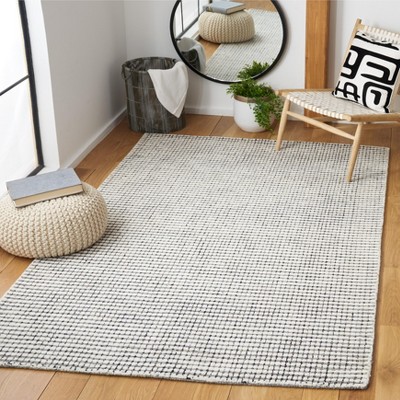 Ivory Round Handmade Tufted Wool Abstract Rug