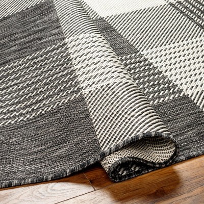 Jarad Black and Cream 5'3" x 7' Woven Indoor/Outdoor Area Rug