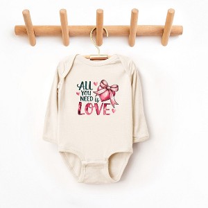 The Juniper Shop All You Need Is Love Coquette Baby Long Sleeve Bodysuit - 1 of 3