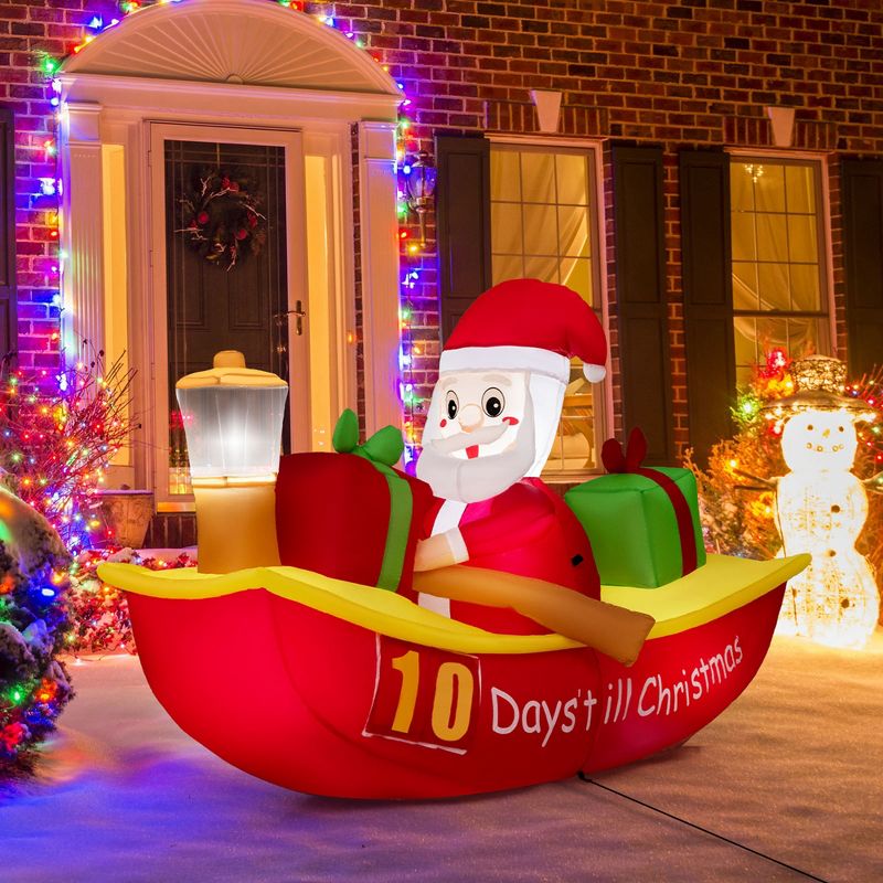 Costway 7 FT Long Christmas Inflatable Santa Claus Rowing Boat with Navigation Light, 2 of 11